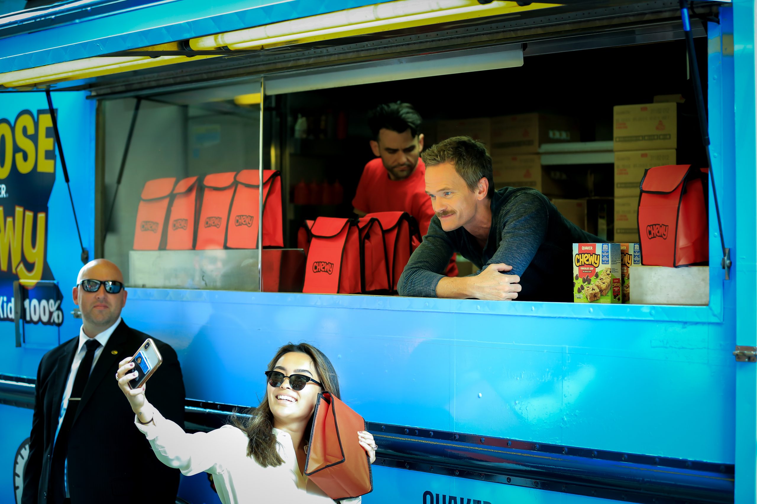 Neil Patrick Harris visits Chewy food truck NYC for adoptaclassroom promotion