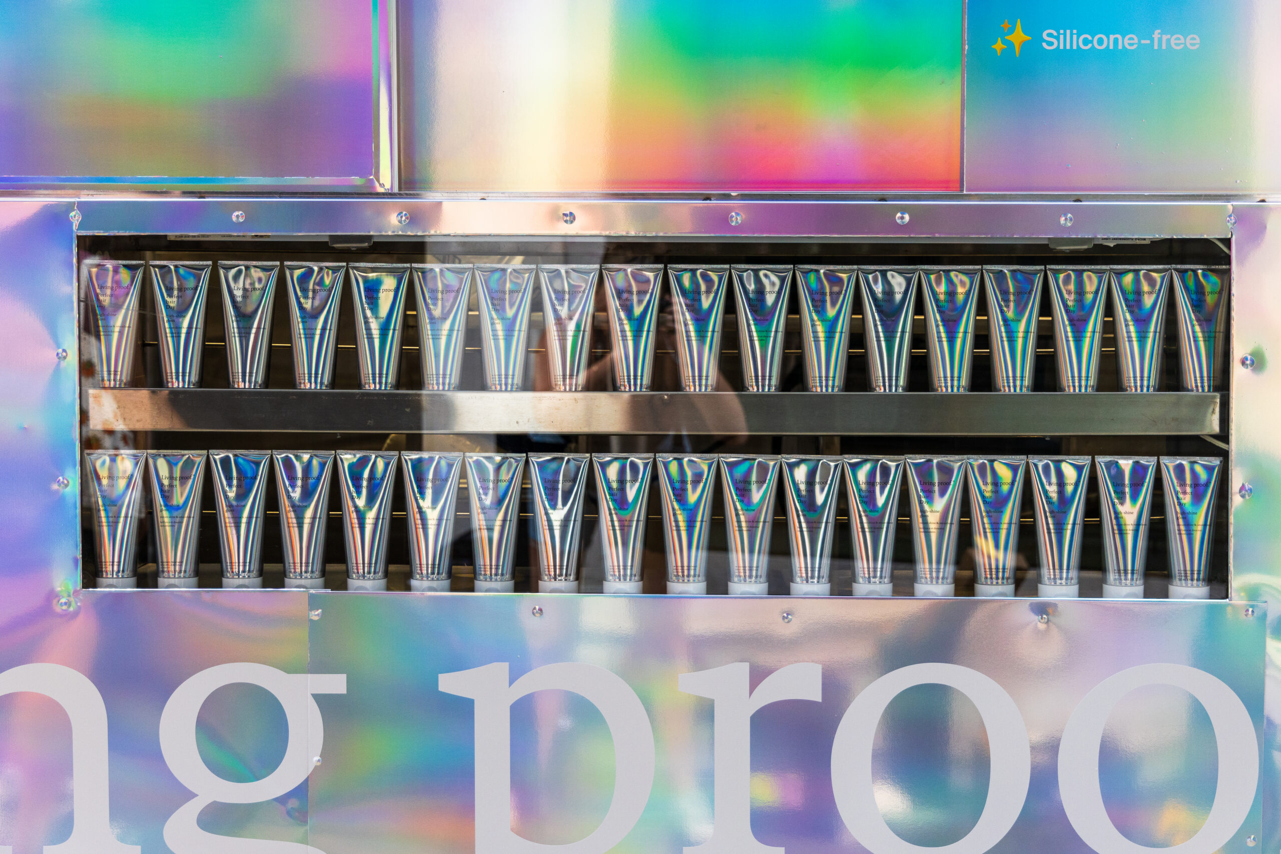 Rows of iridescent tubes in a metallic case, with “Silicone-free” and “ing proo” on front.
