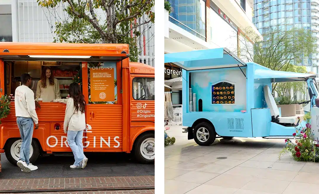 Split image: Left side shows an orange food truck labeled "Origins," where two people are being served by a vendor, highlighting the benefits of experiential marketing. Right side displays a light blue food truck labeled "Bob's Well Bread," parked in an urban setting.