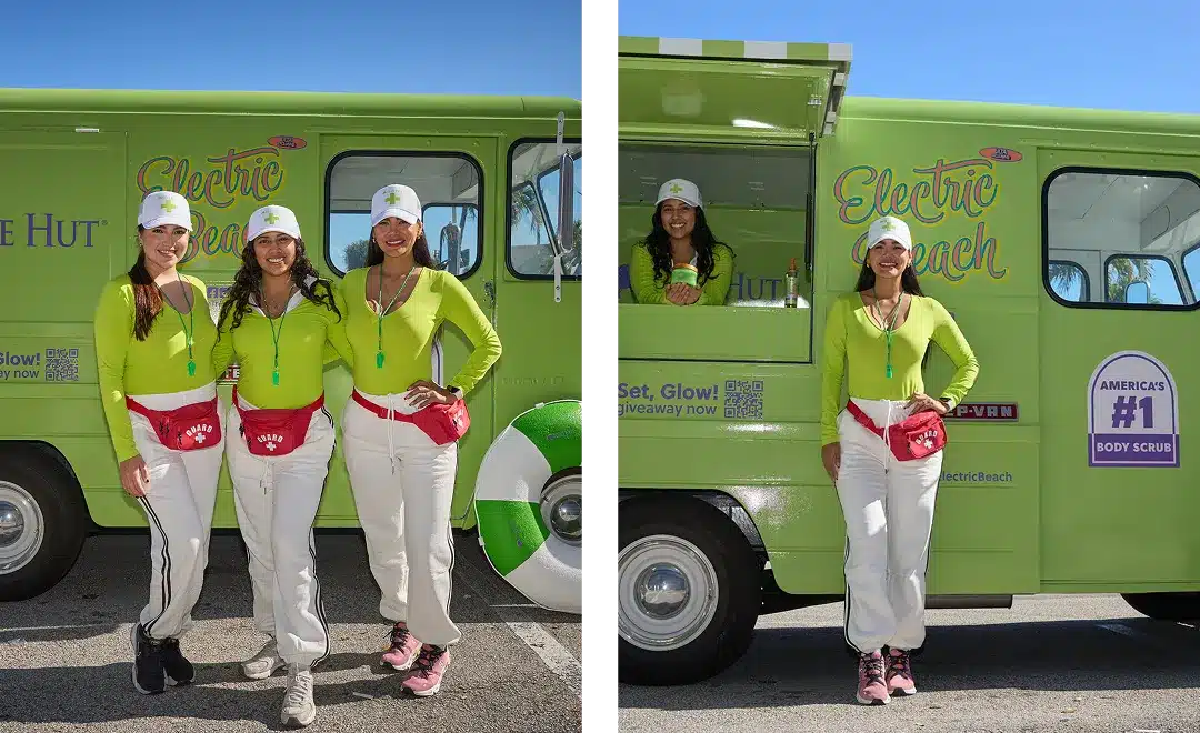 Three people wearing lime green tops and white pants stand in front of a green "Electric Beach" truck, illustrating the benefits of experiential marketing. They're all smiles, with two in white caps and one donning a red fanny pack. Inside the truck, through an open window, a woman waves cheerfully.