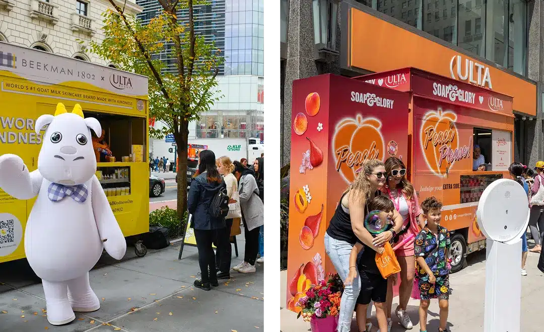 Two images side by side: left, a person in a white goat mascot costume waves beside a yellow Experiential Marketing Vehicle as people gather; right, a family poses in front of an orange Ulta soap-themed truck with flowers and balloons.